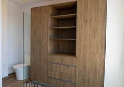 Ground Level | Lobby B | 1-Bedroom Apartment - Image 5